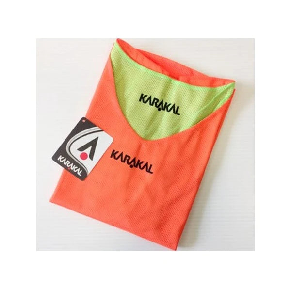 Karakal reversible bib Orange Green